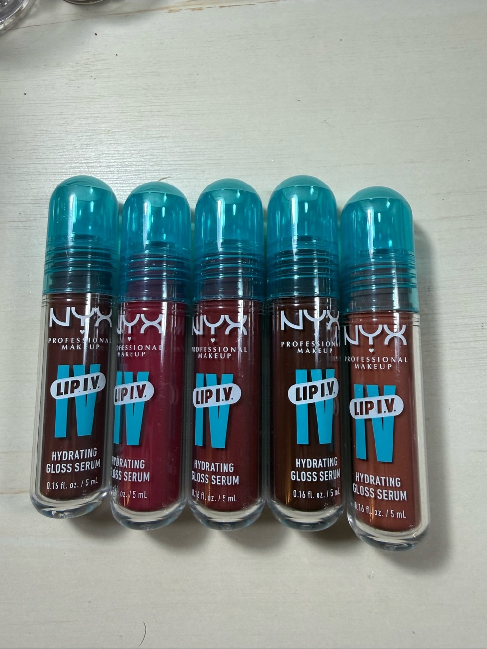NYX Lip I.V. Hydrating Gloss Serum Set - Teal Caps with Berry, Red & Nude Shades